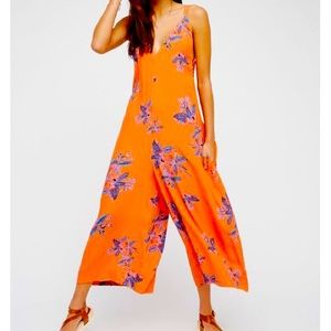 Free People Dream Big Jumpsuit in Orange. Size Medium M
